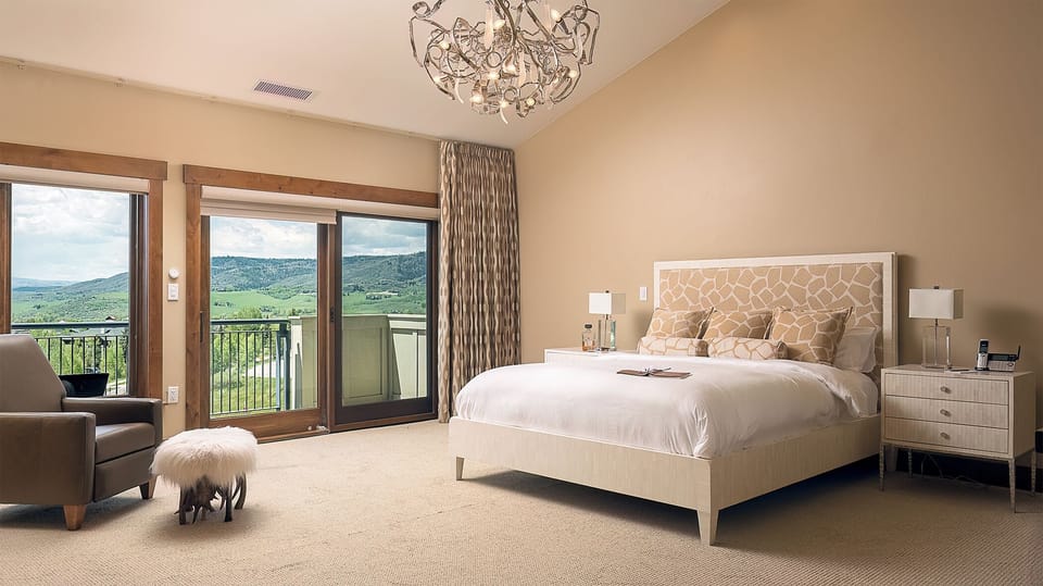 Bedroom 1, Main Level - Primary king suite with fireplace and TV