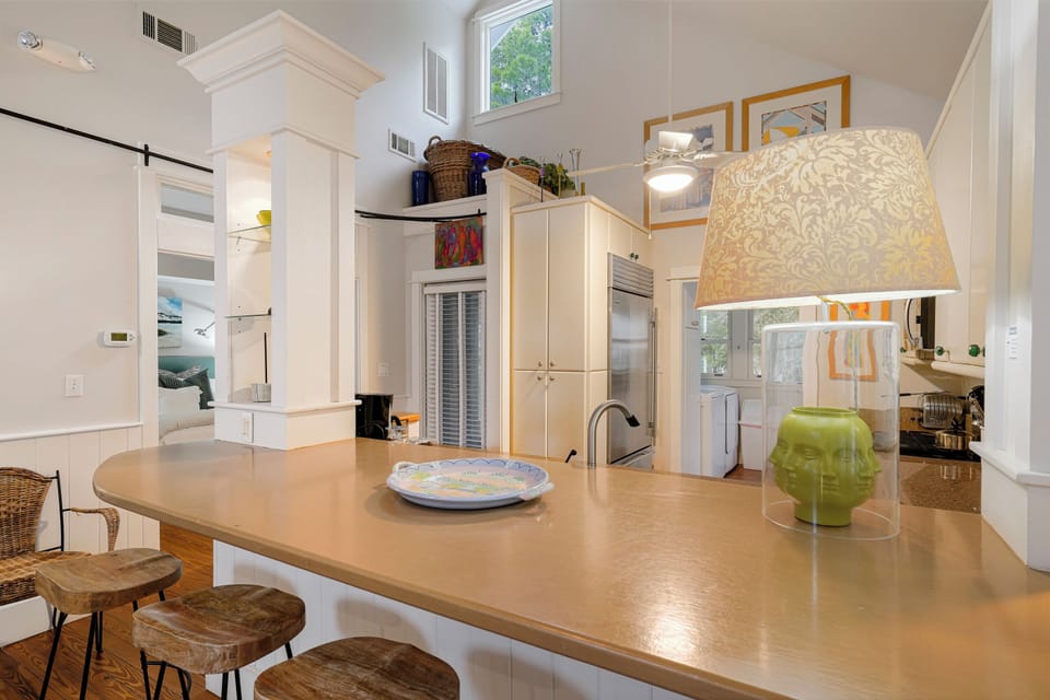 VIEW TO KITCHEN FROM BREAKFAST BAR