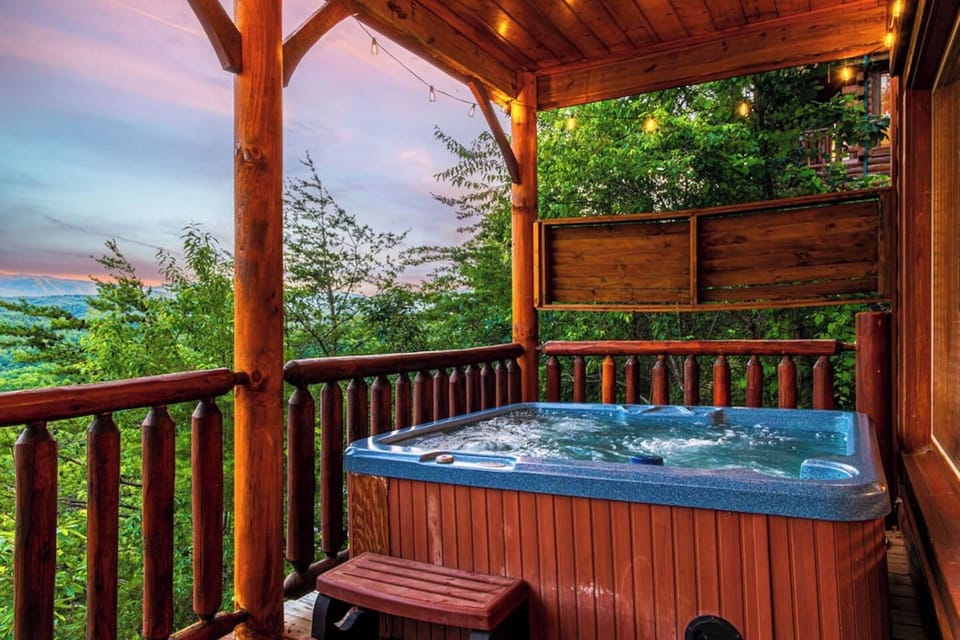 Soak in your private hot tub over looking the Smoky Mountains