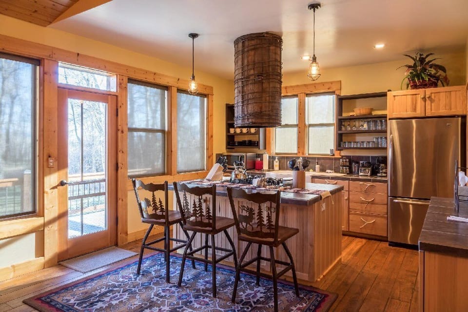 Warm and inviting kitchen with access to the deck.