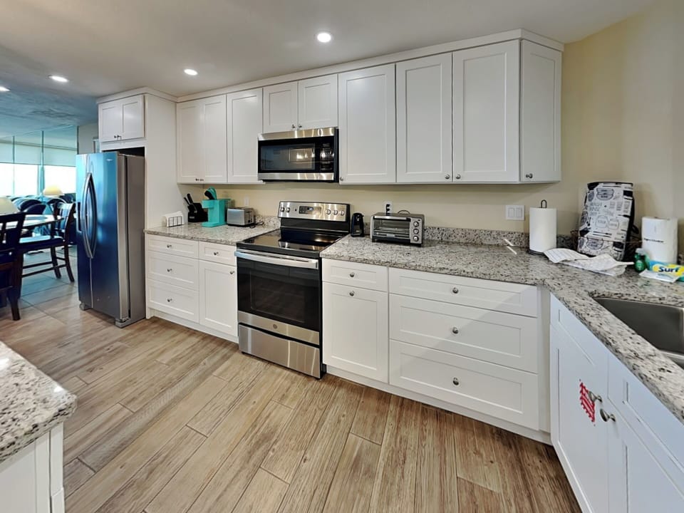 Fully Equipped Kitchen with Stainless Steel Appliances