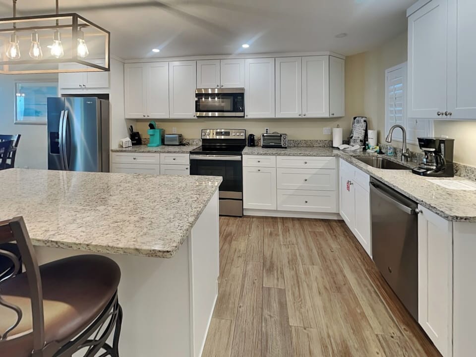 Fully Equipped Kitchen with Stainless Steel Appliances