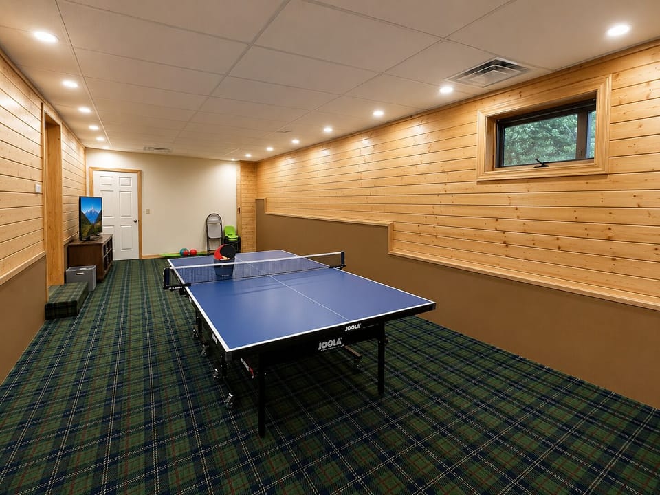Downstairs Bonus Room with Ping Pong Table and TV