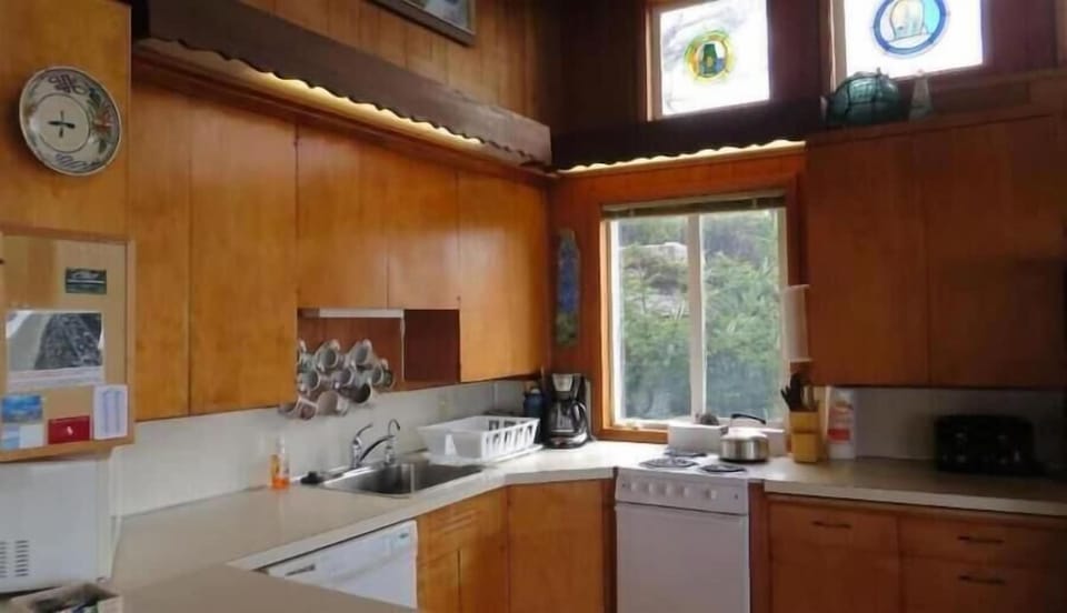 Kitchen - with apartment sized range and full size dishwasher