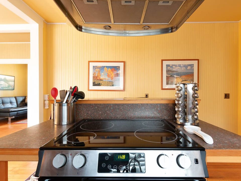 You will enjoy cooking in the Main House on this flat top stove!