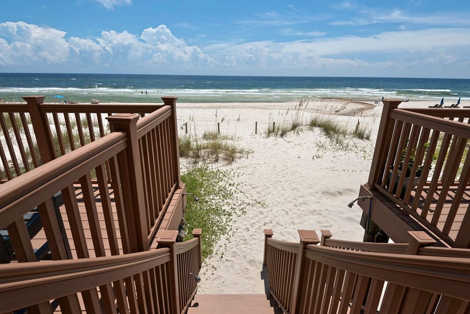 Deck - Footsteps from the beach!