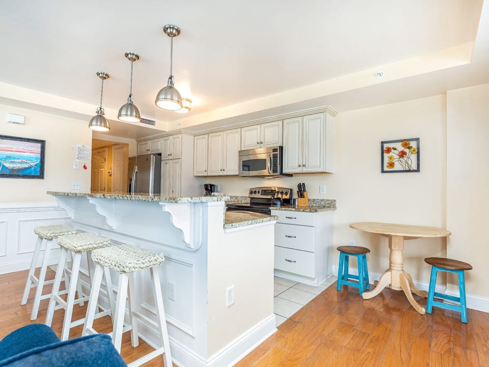 Kitchen with counter seating  for 3