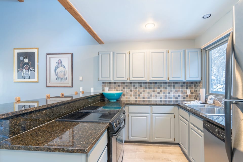 The kitchen with an oven and counters