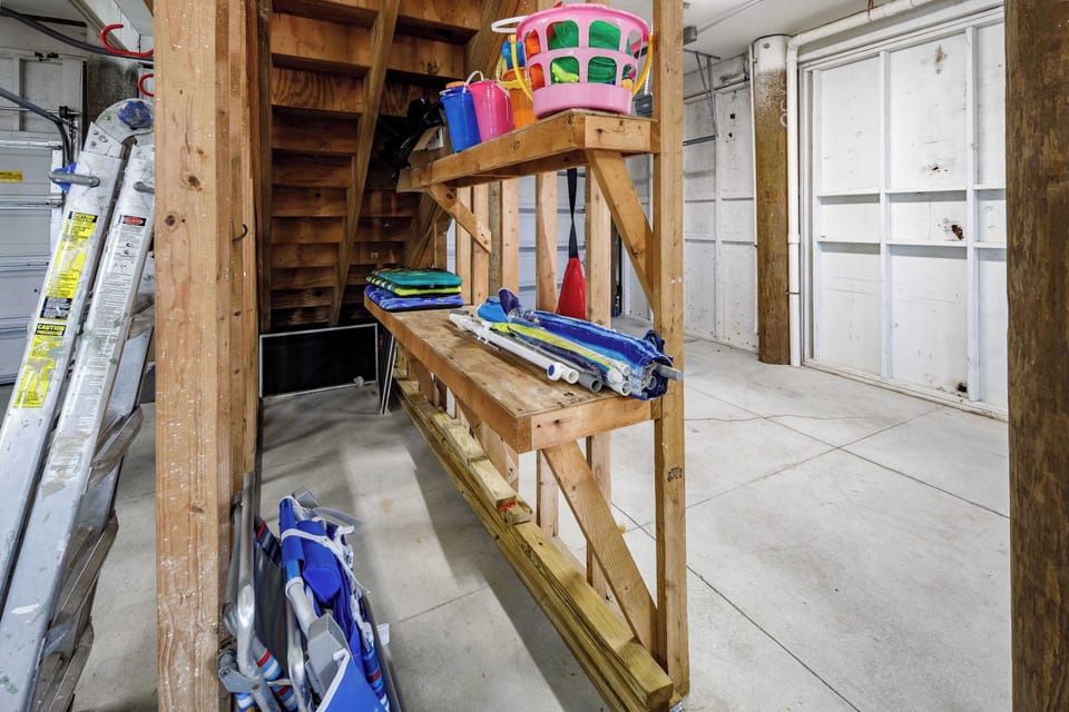 Beach items for guests in the garage