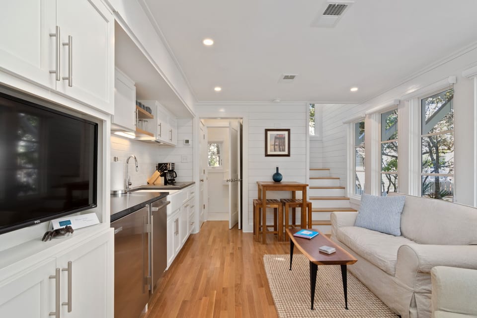 LIVING AND KITCHEN OFF FRONT ENTRANCE, LARGE FLAT SCREEN TV