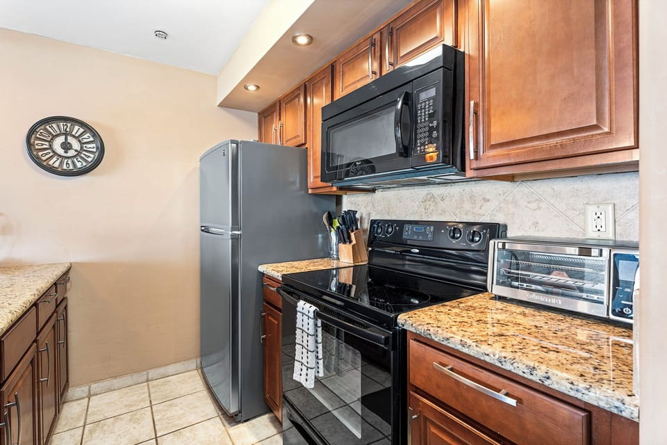 Features granite countertops and top-of-the-line appliances