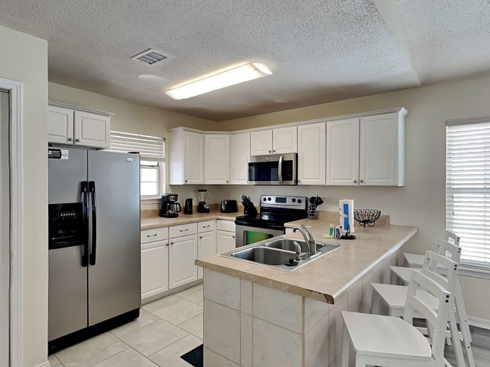 Fully Equipped Kitchen with Bar Seating
