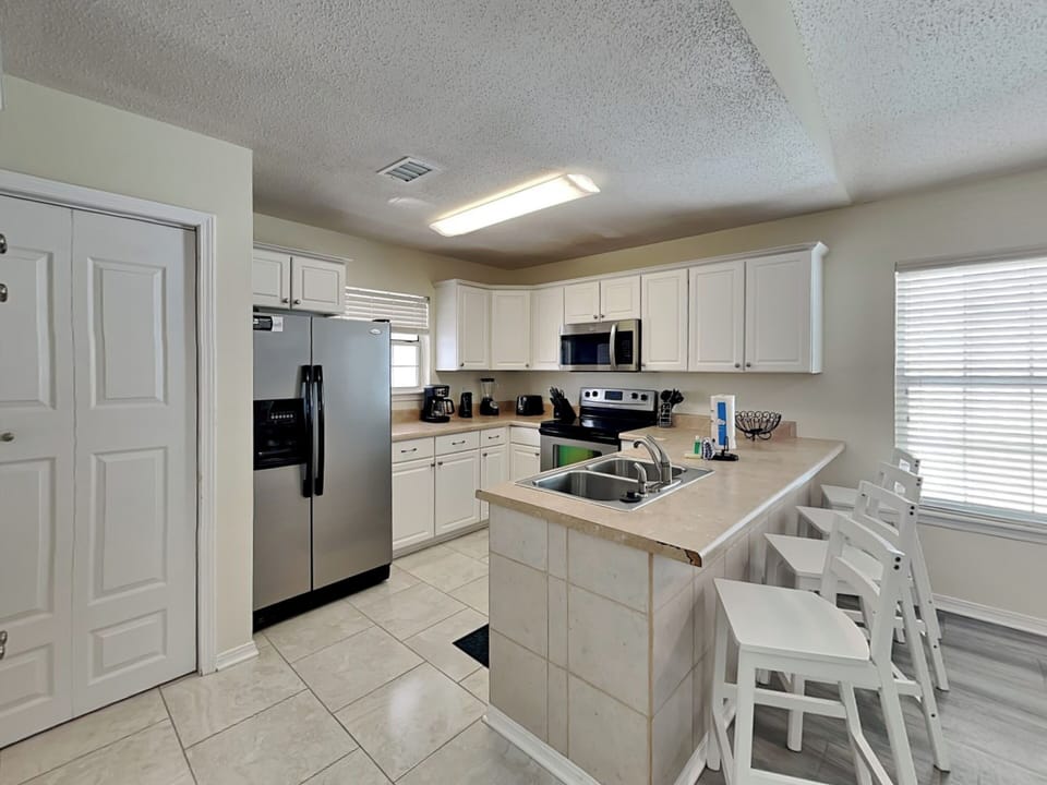 Fully Equipped Kitchen with Bar Seating