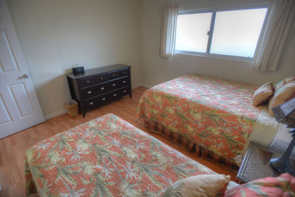 Love To Sleep? - This comfy bedroom is sure to be the site of long leisurely naps and deep sleep in the evening.