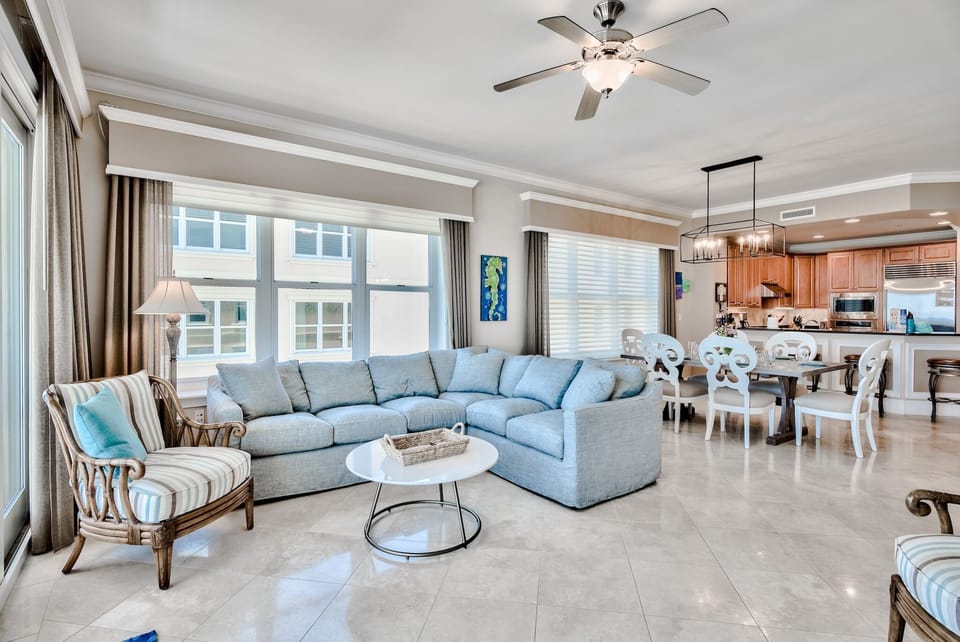 Living room and dining area of A305 - Polished travertine tile in the spacious living and dining area of Adagio A305.