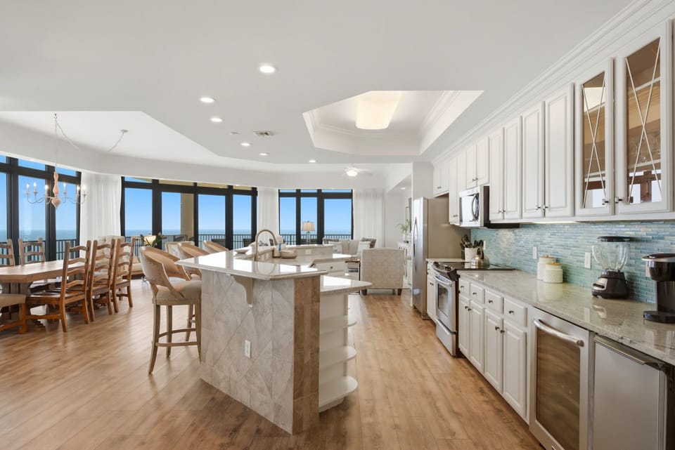 Open concept kitchen, living and dining