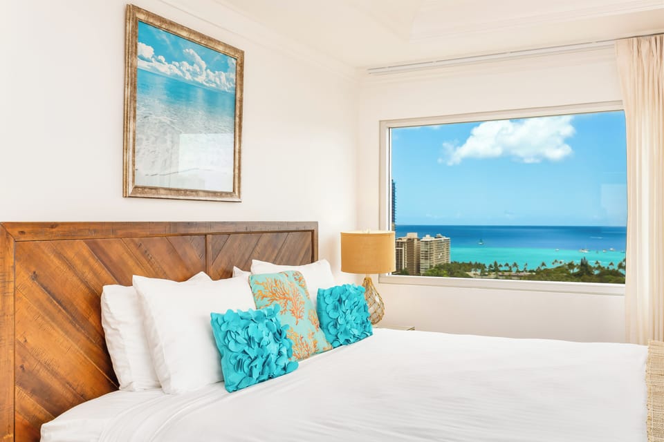 Wake up to ocean views from the comfort of your bed
