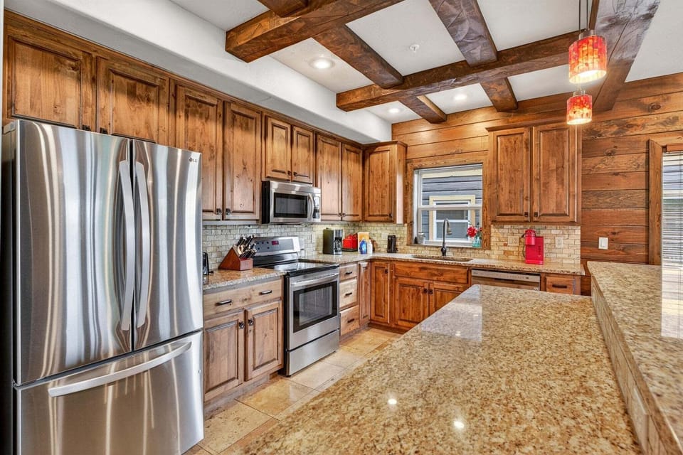 Enjoy stainless steel appliances and quality granite counter tops