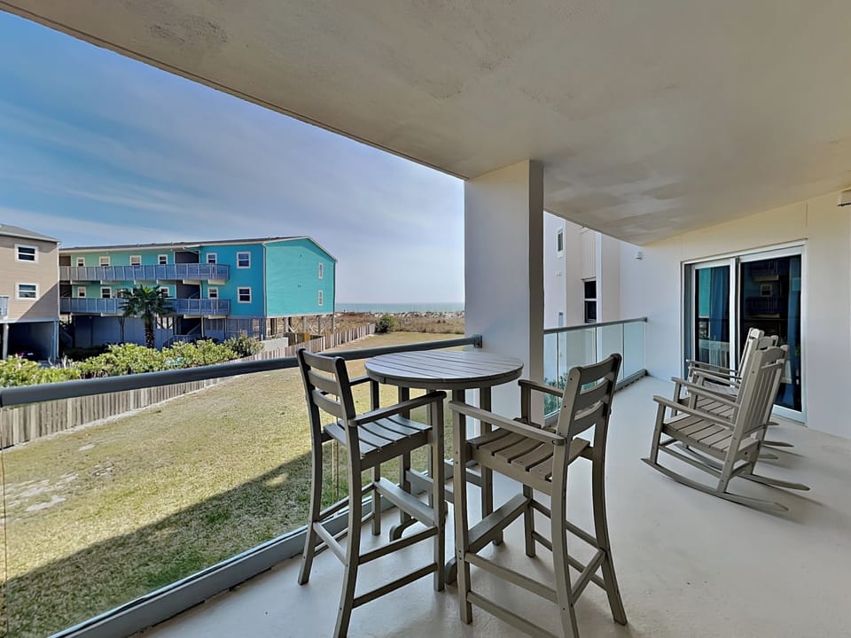 Private Balcony with Gulf Views and Outdoor Seating