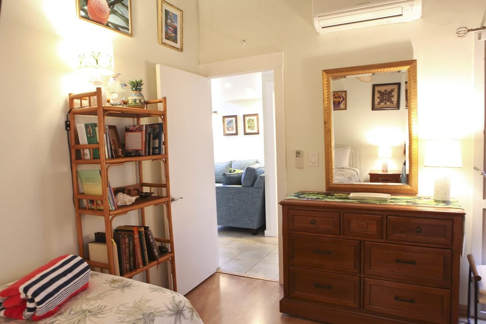 Main level bedroom has comfortable twin beds which can be conver - Main level bedroom  has AC to keep you cool and comfortable.