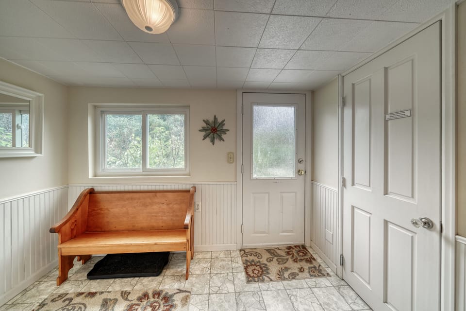 Back entry leads to a private backyard