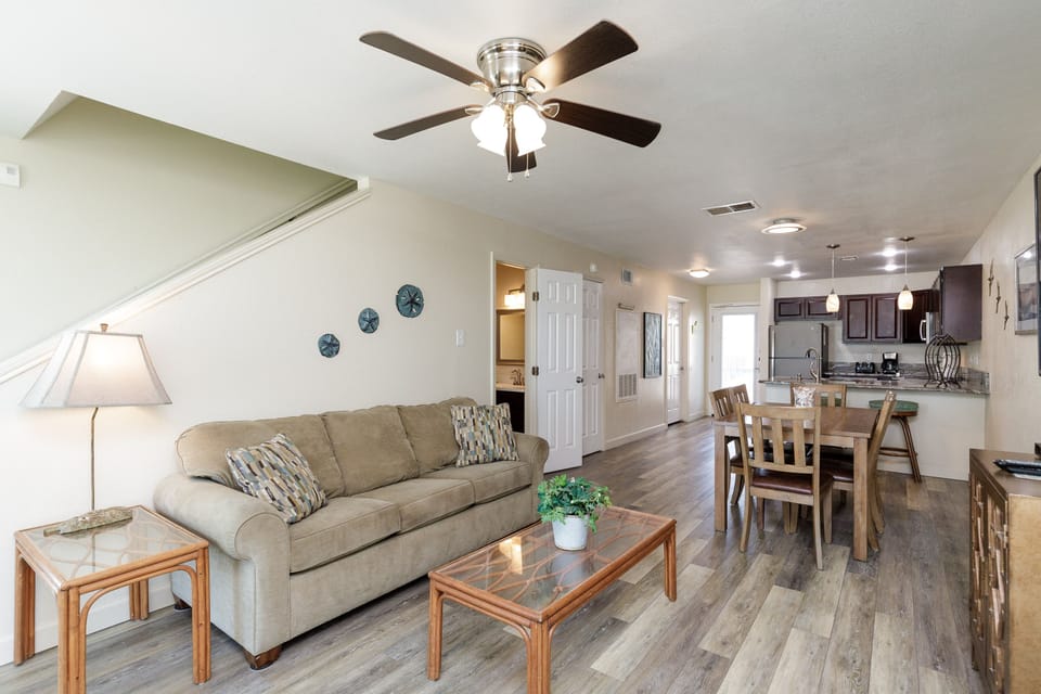 Relax in your spacious open-concept living space with comfortable seating and sleeper sofa