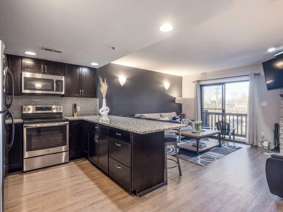 Fully Equipped, Newly Remodeled Kitchen with Stainless Steel Appliances, Bar Seating for 4