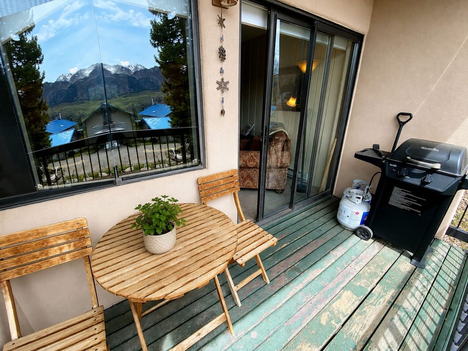 Balcony Deck with Seating and Gas Grill