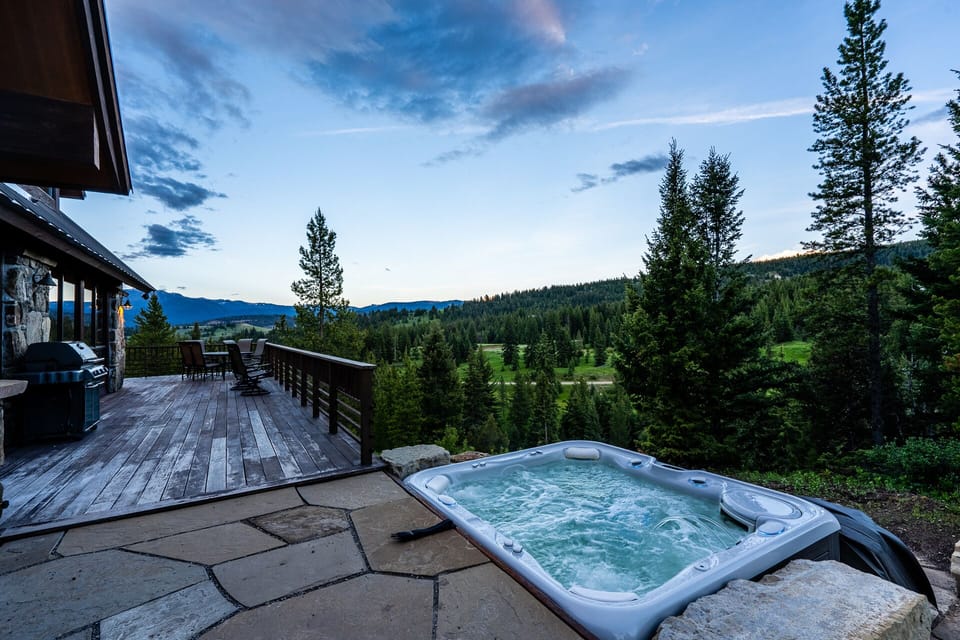 Relax amongst beautiful views in the hot tub.