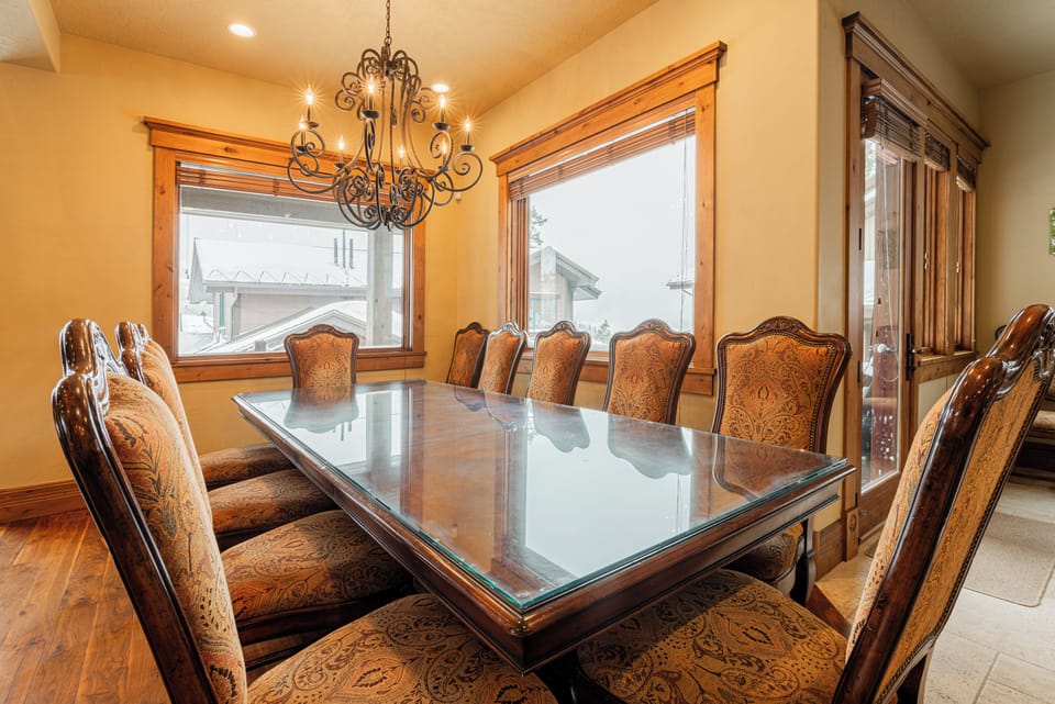 Large wood dining table with seating for 12