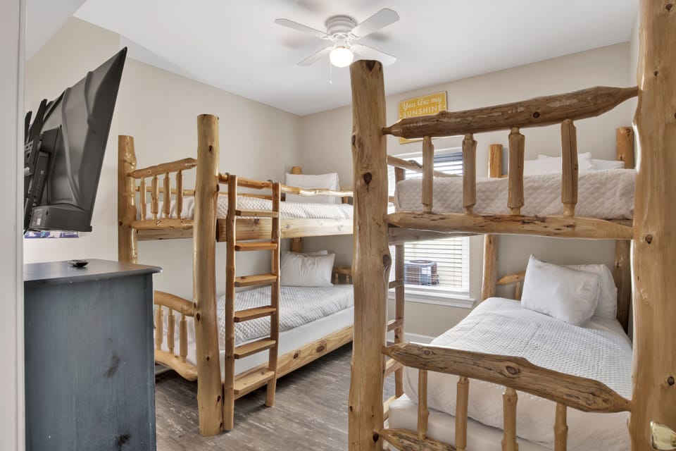 Bedroom 5 has a TV and two Twin over Twin bunk beds - sleeps 4