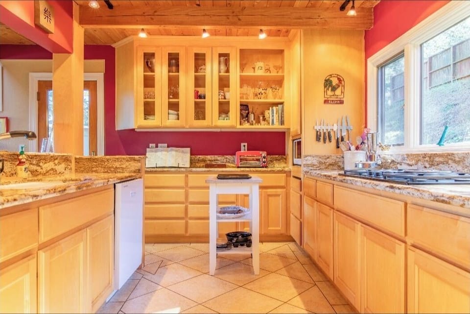 High End Kitchen with Brazilian Marble Counter Tops and Custom Made Cabinets.