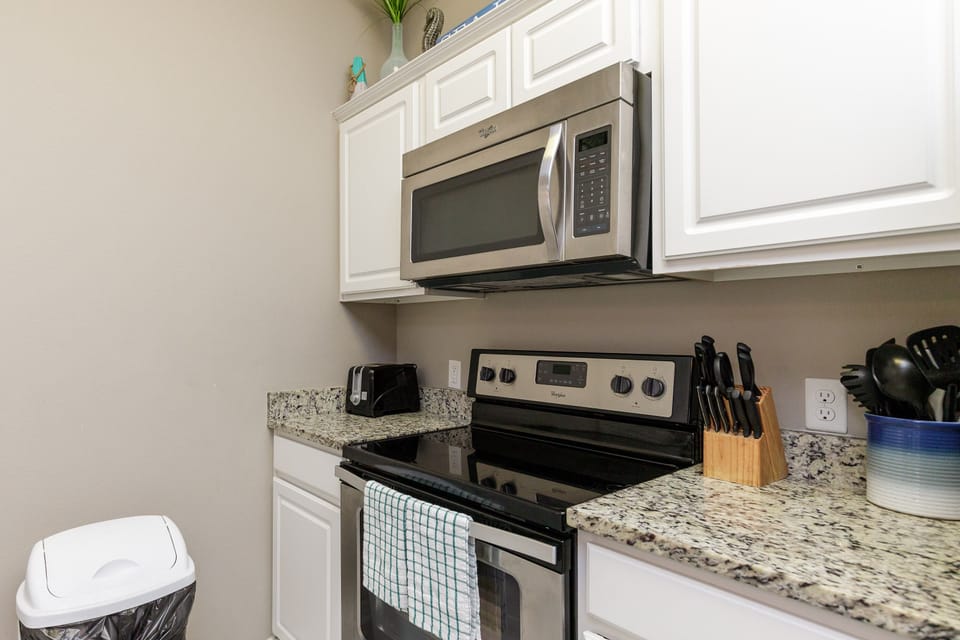 Fully equipped kitchen with stainless steel appliances