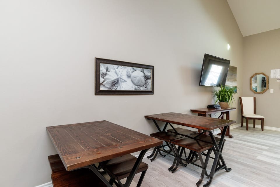 Two dining tables with seating for eight