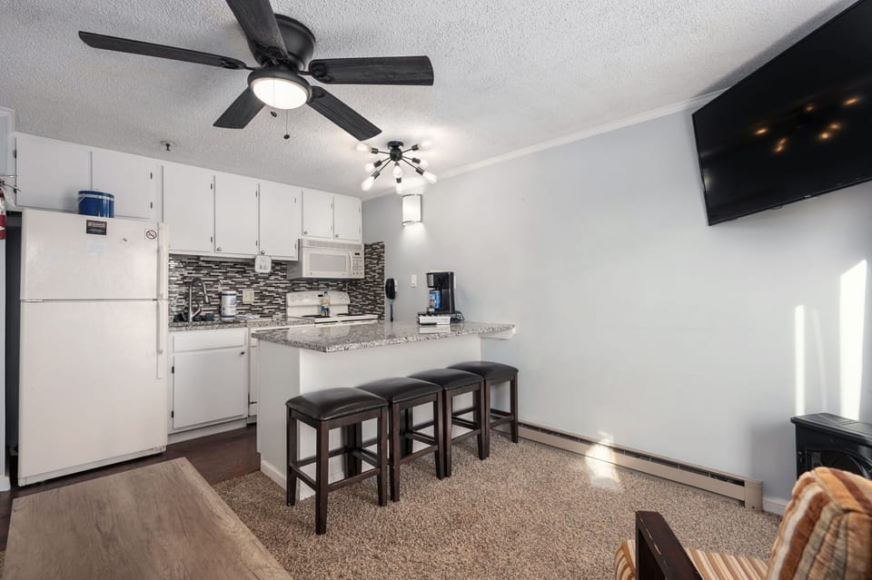 The updated Kitchen island which can sit four people
