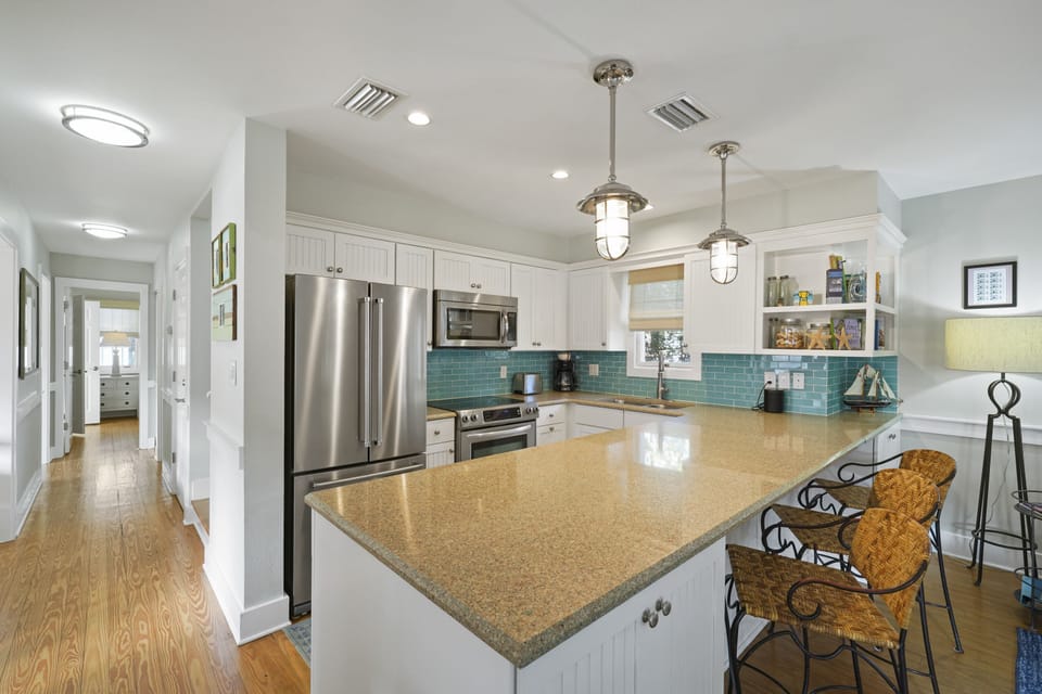 UPDATED KITCHEN W/BAR SEATING FOR 3