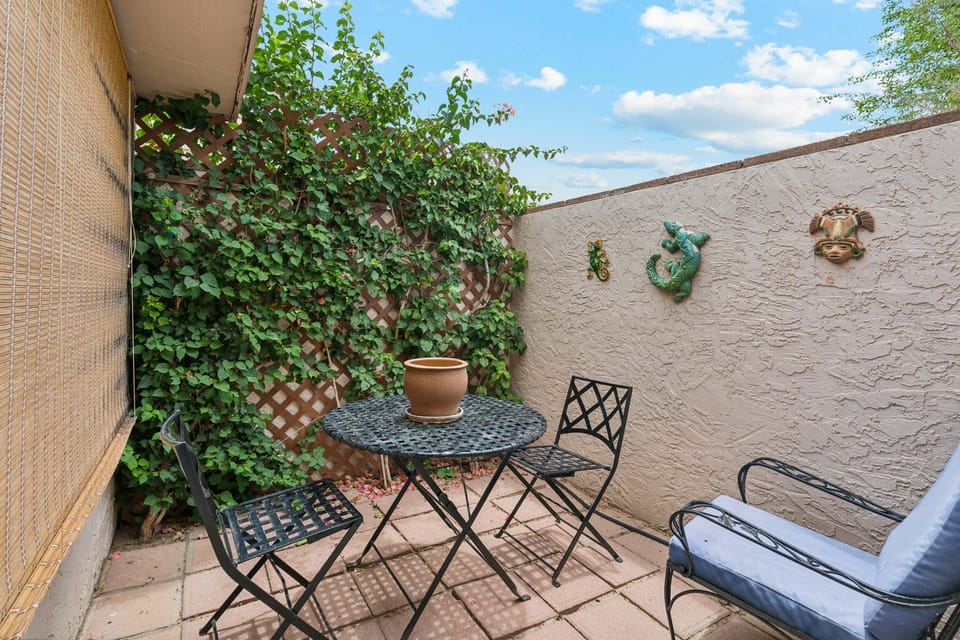 Enjoy a morning cup of coffee off the primary suite on the private patio.