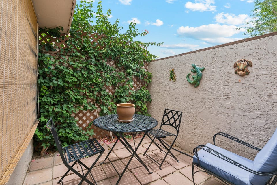 Enjoy a morning cup of coffee off the primary suite on the private patio.