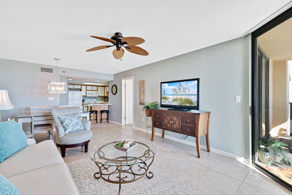 Living Area with a Sleeper Sofa and access to private balcony overlooking the Gulf