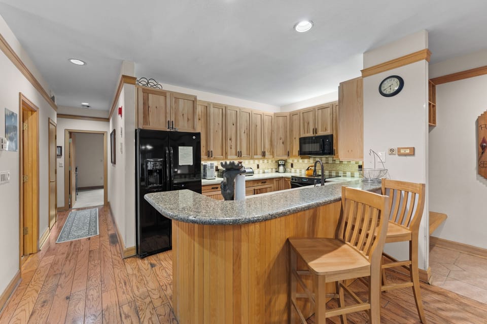 Full kitchen with granite counter tops