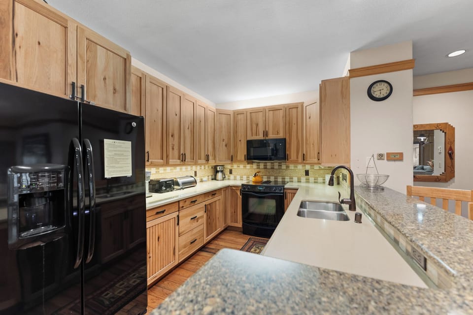 Full kitchen with granite counter tops