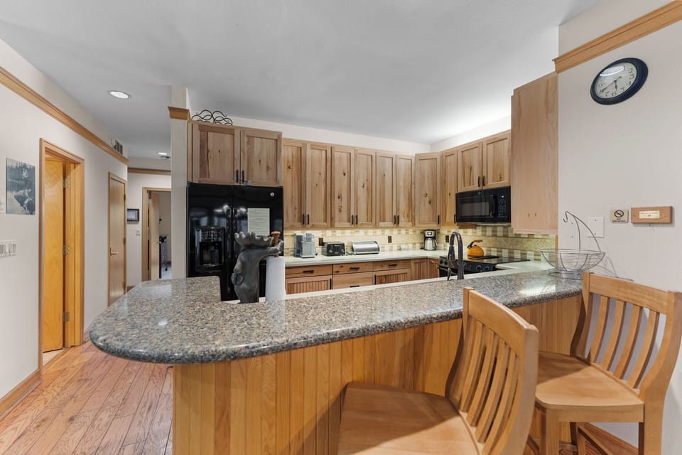 Full kitchen with granite counter tops