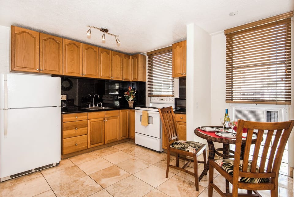 Immaculate Kitchen with Dining Area and Window AC
