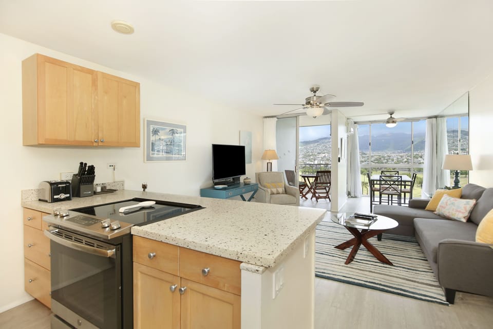 Kitchen Island with Vibrant Mountain and Golf Course Views