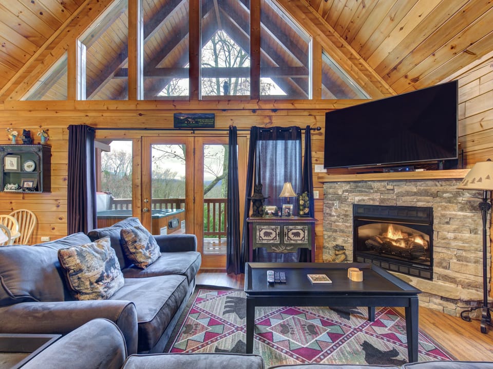 Living Room - Deck Access, TV, Fireplace, Sleeper Sofa - First Floor