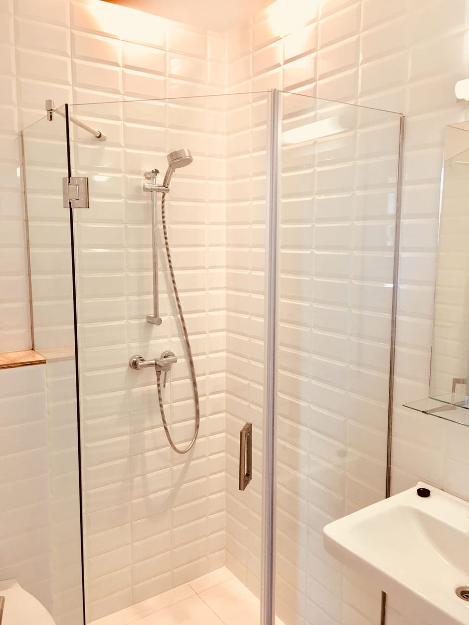 Two shower rooms with wash basins and toilets