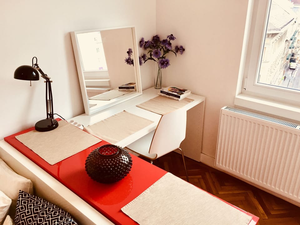 Bright desk and work area in one bedroom