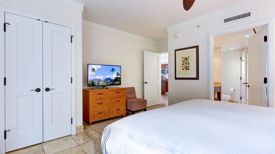 Guest bedroom closet offers extra storage space 