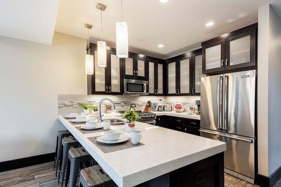 Viking Stainless Steel Appliances, including a 6-Burner Gas Range, and Granite Countertops