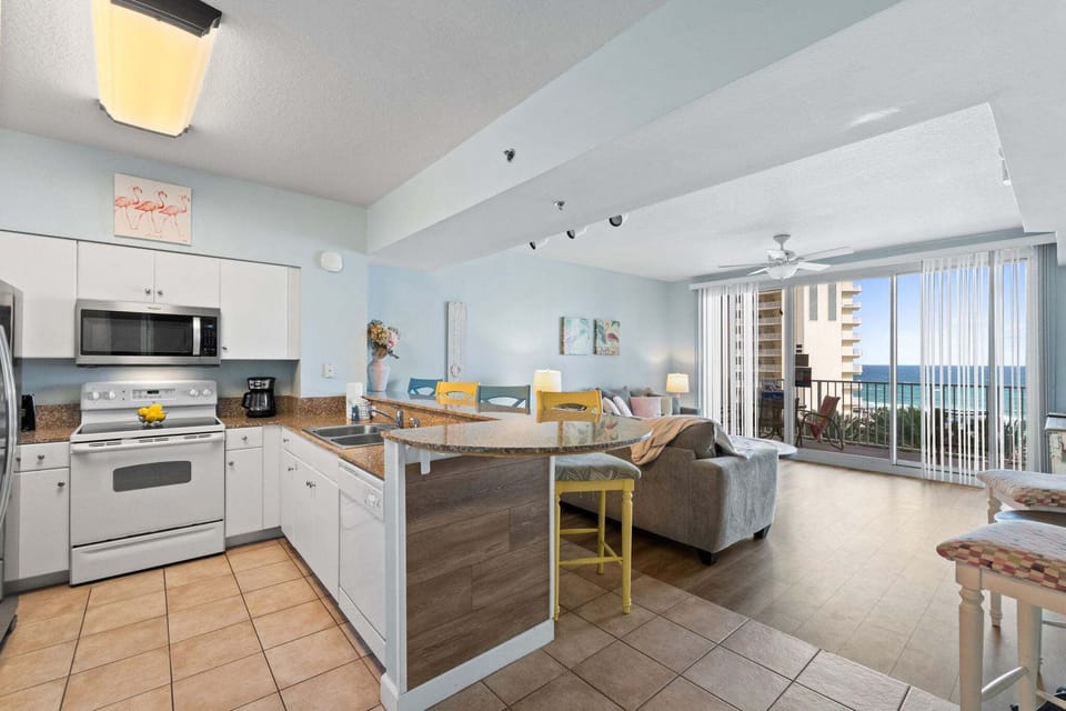 Fully Stocked Kitchen with Bar Seating